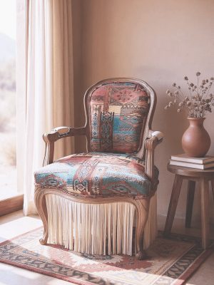 Custom fringe accent chair in sunlit desert-style interior