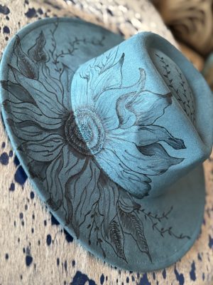 IMG_1701 peacock blue wide brim hat with a hand burned design of a sunflower.