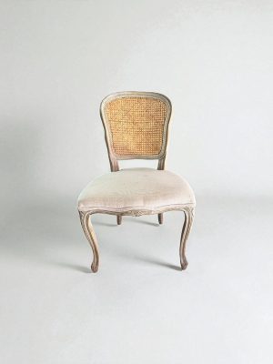 customizable chair cane back accent chair available for customization. Armless accent chair with vintage carved frame and weathered wood.